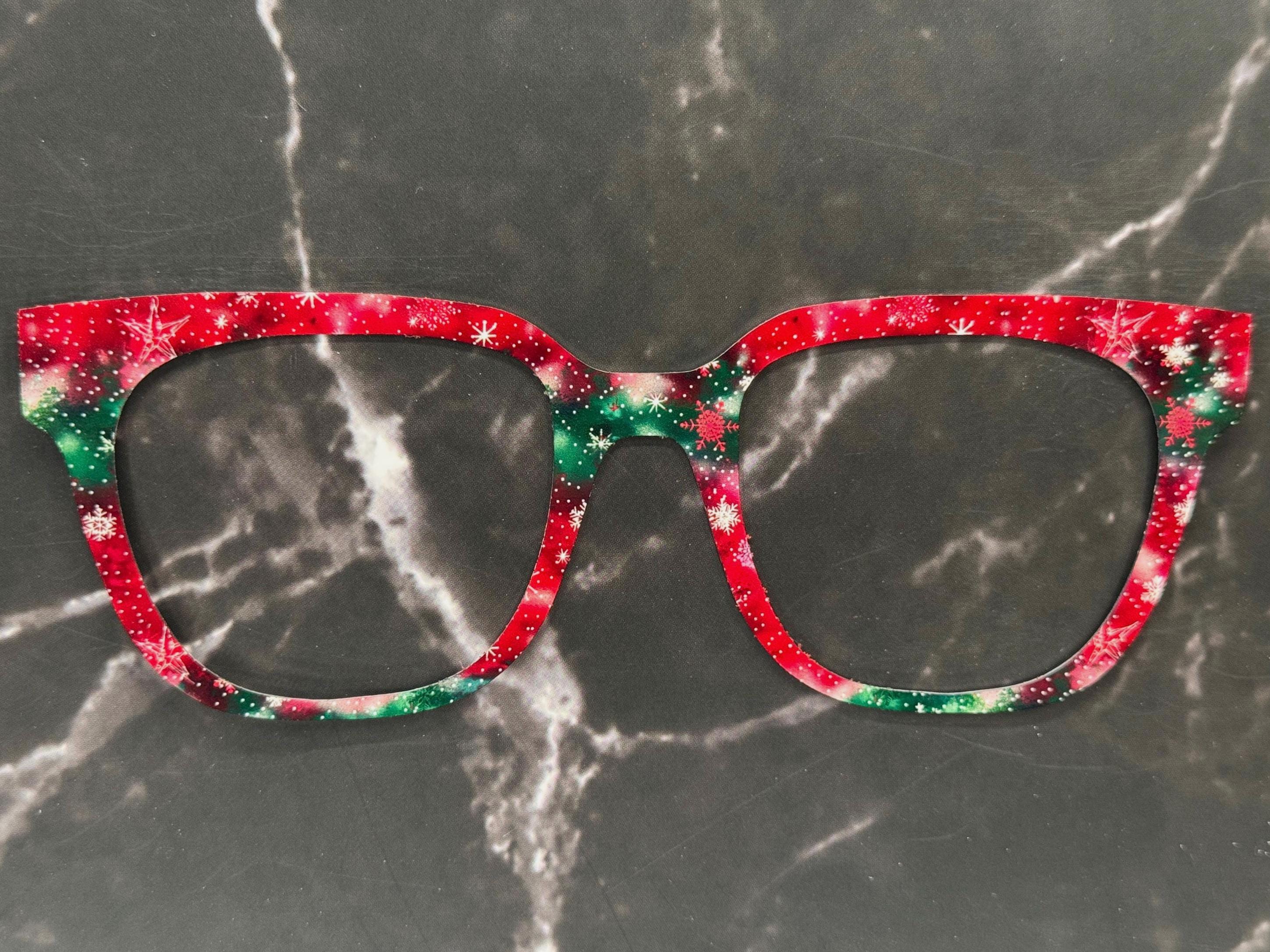 snowflakes against a green and red background giving a winter and Christmas vibe for metal toppers for Pair Eyewear top frames
